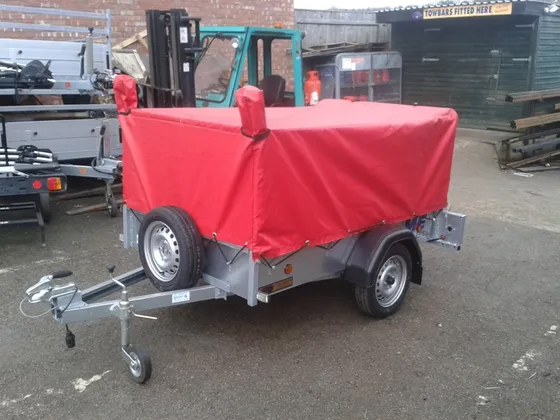Two Boxing Ring Canvases with Red and Royal Blue Floorings, with corner pads and rope covers